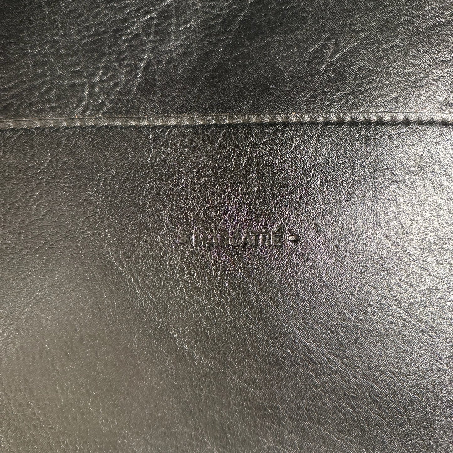 Pair Of 1973 Marcatre Leather chairs