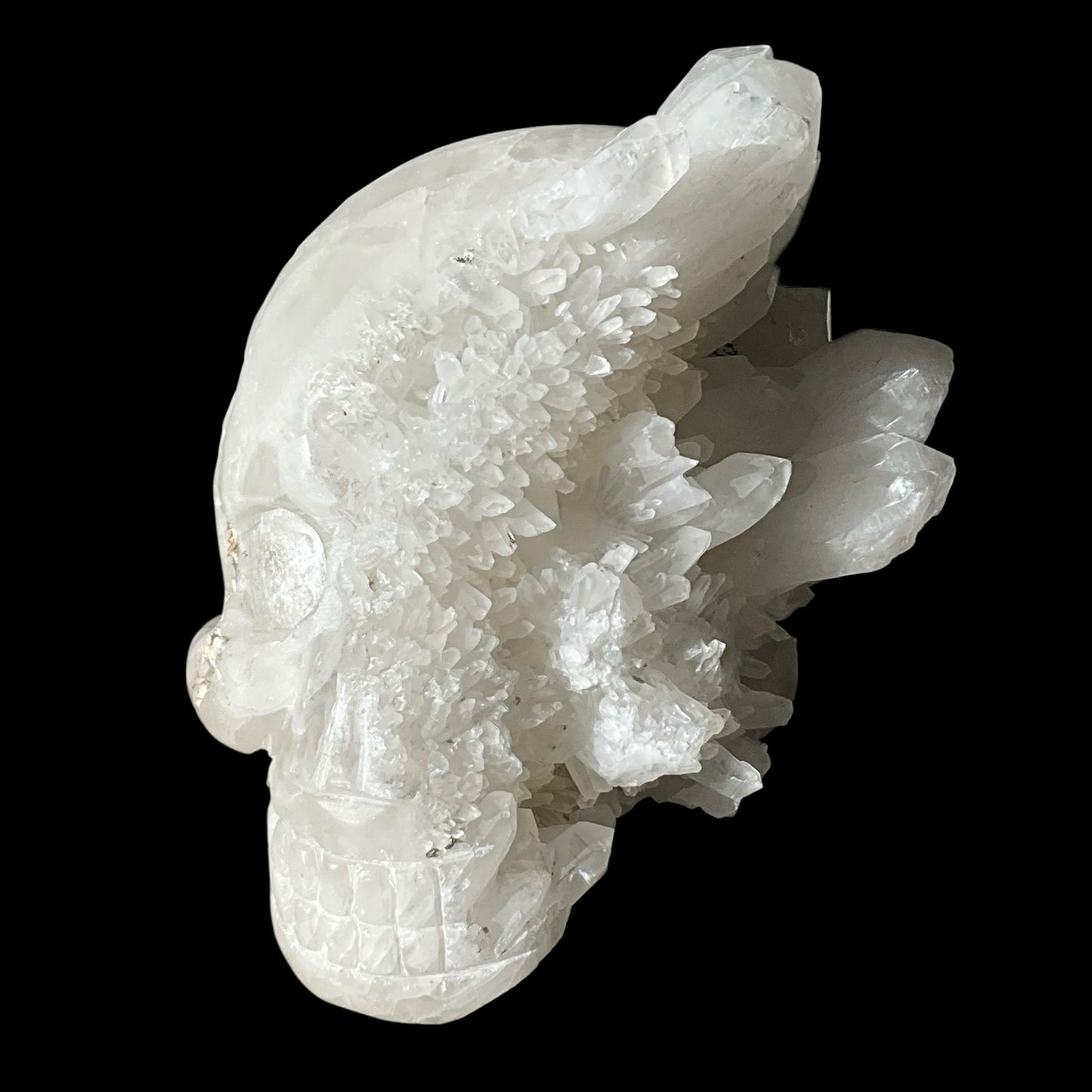 Quartz Crystal Carved Skull with Natural Generators