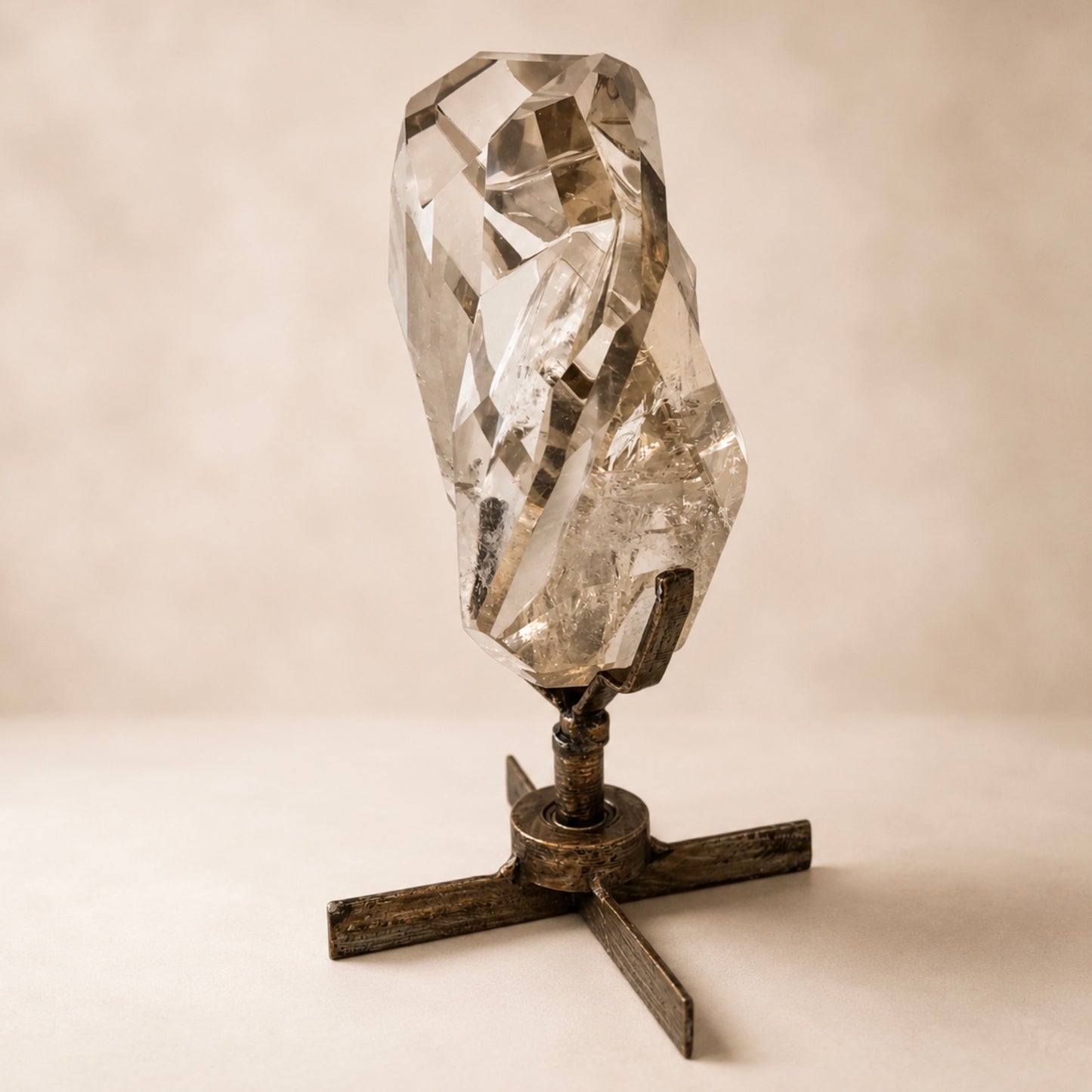 Clear Smoky Quartz Faceted Crystal on Spinning Stand