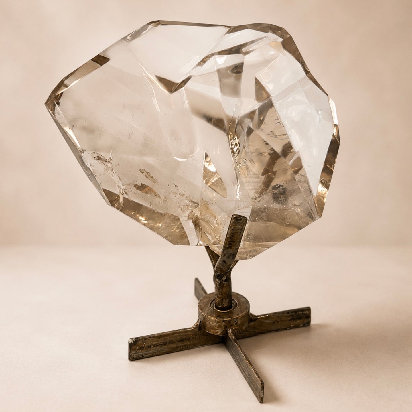 Clear Smoky Quartz Faceted Crystal on Spinning Stand