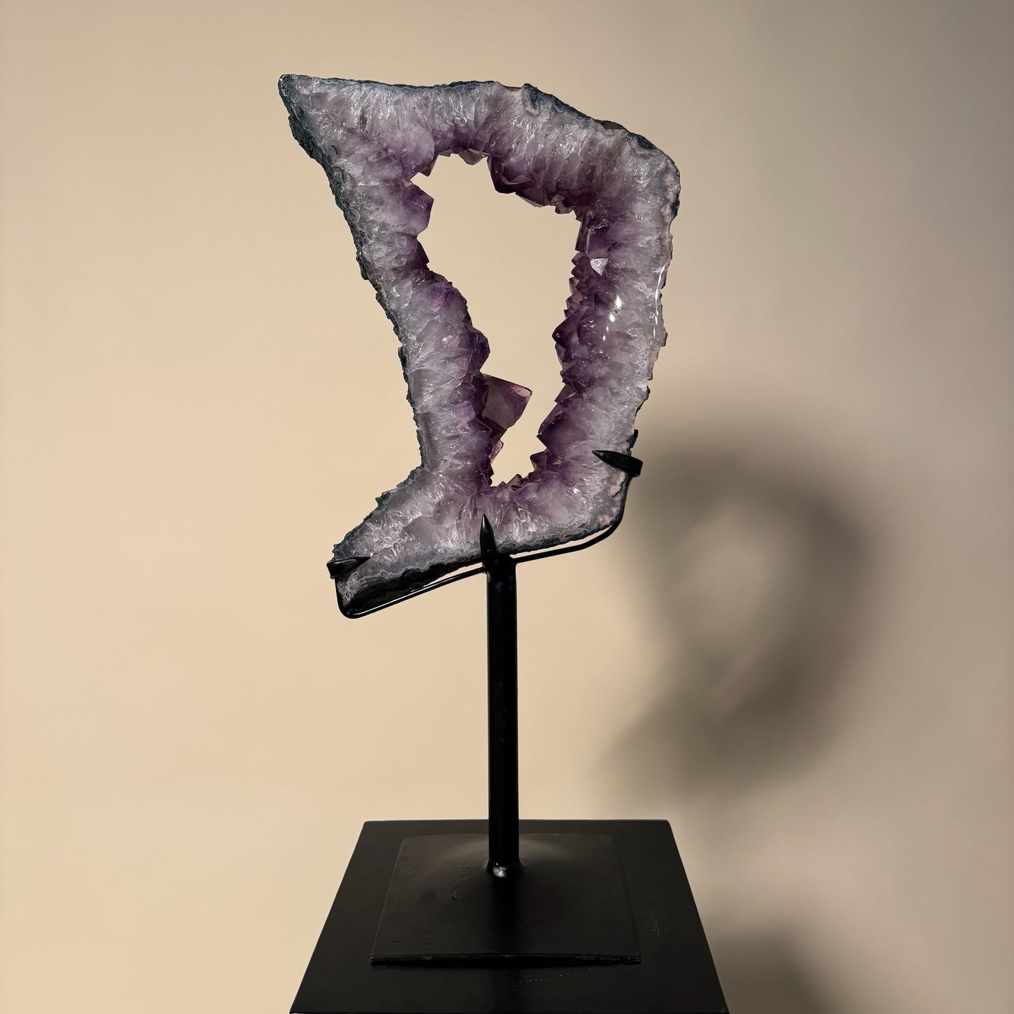 Cut-Out Amethyst Crystal Geode on Metal Stand