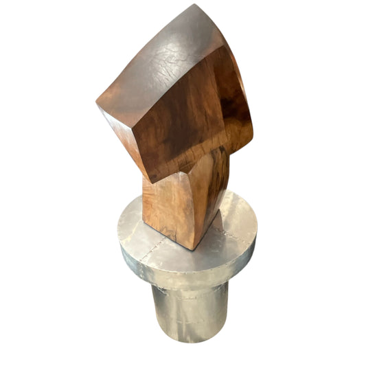 Wood sculpture on Metal table