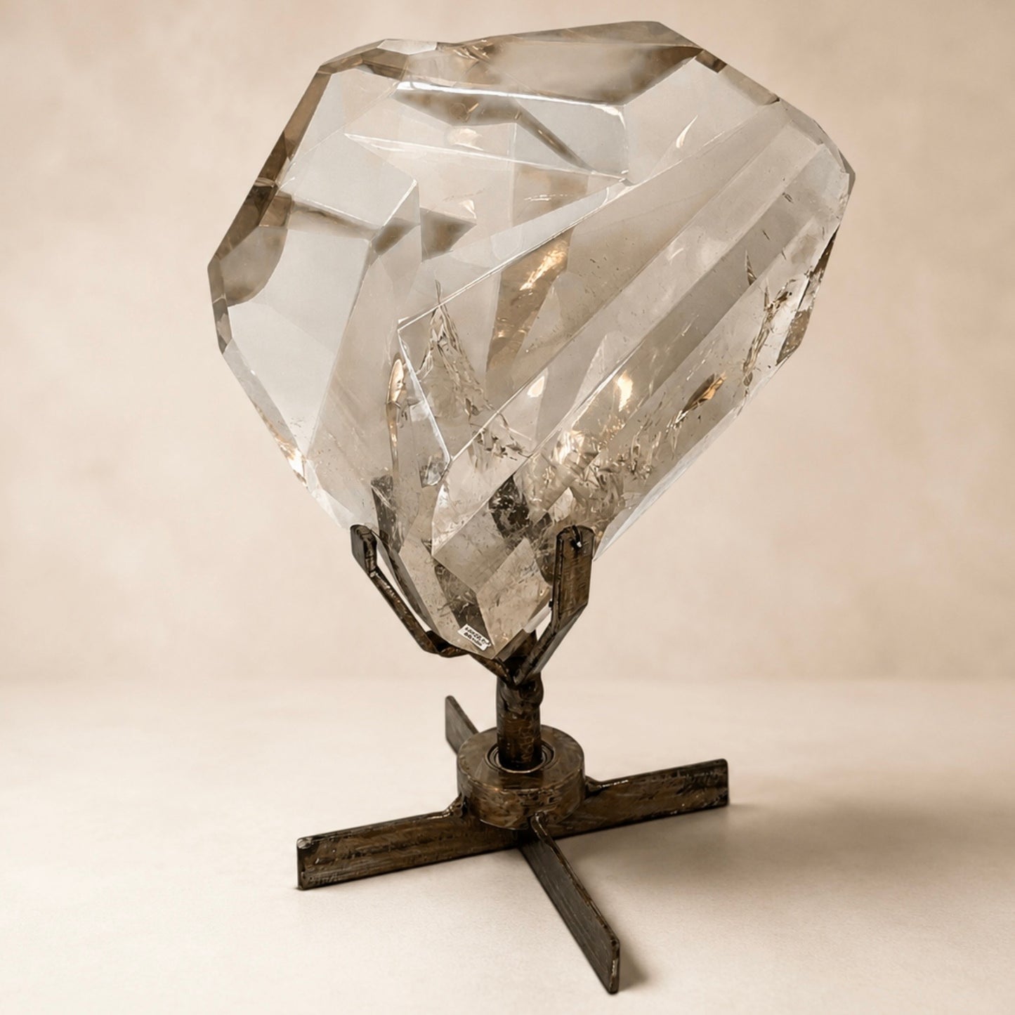 Clear Smoky Quartz Faceted Crystal on Spinning Stand