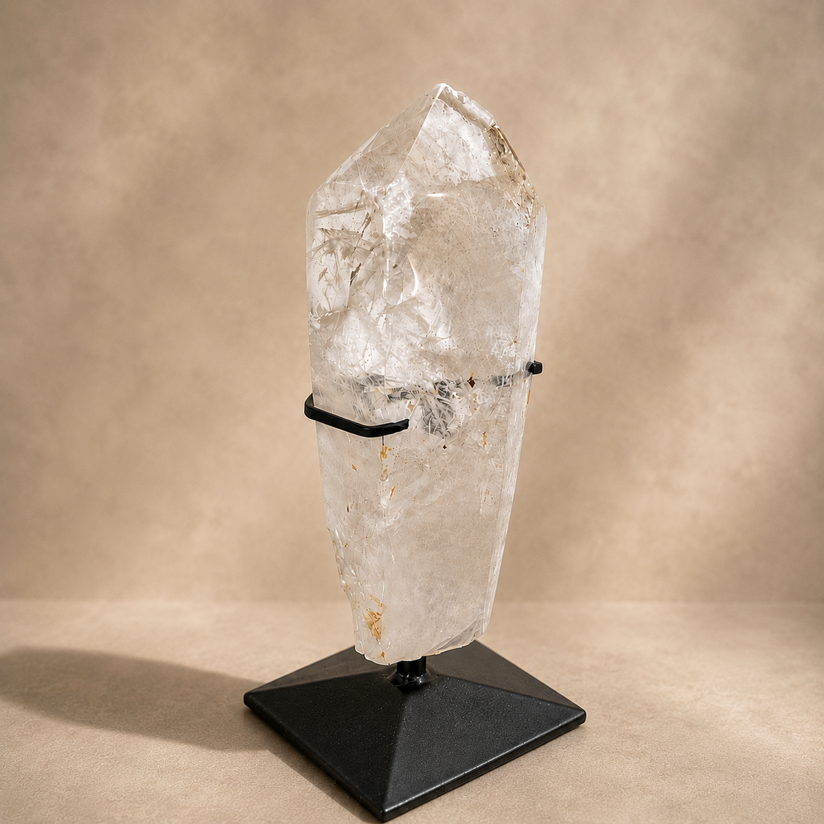 Quartz Crystal Generator on Black Metal Stand