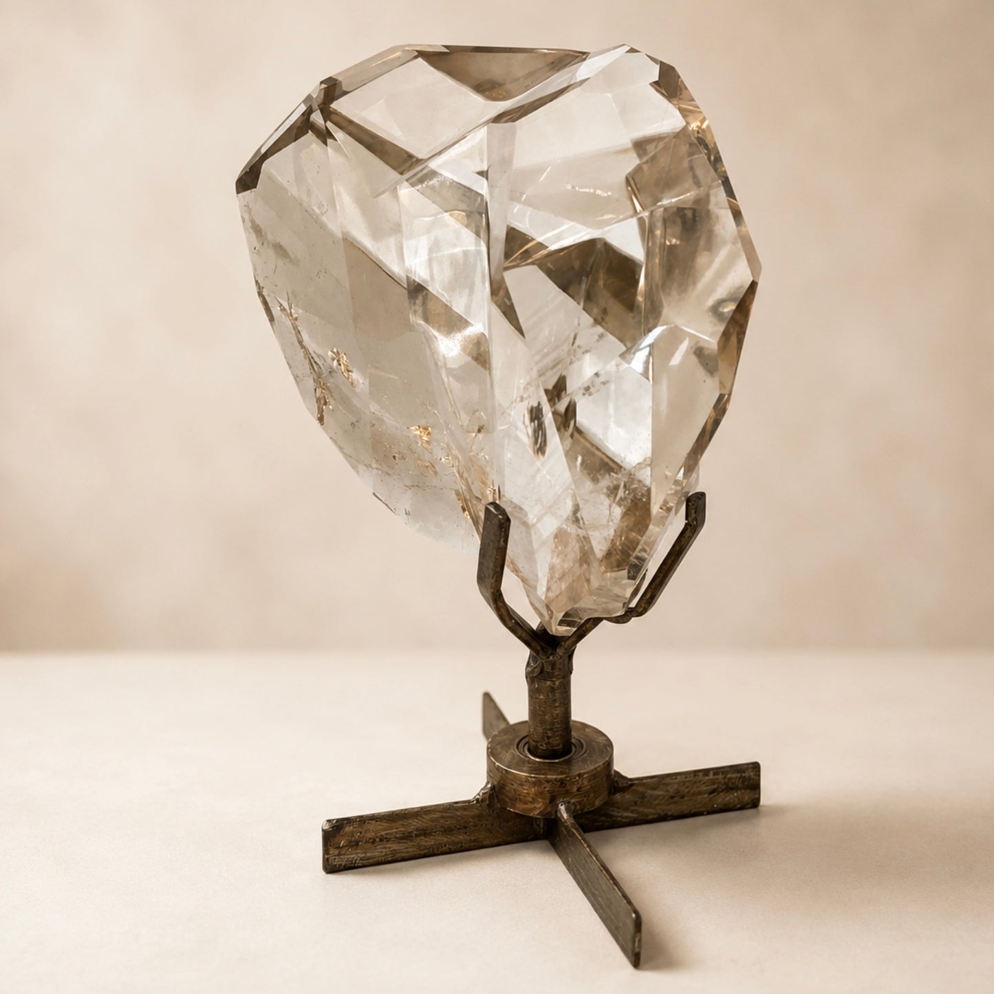 Clear Smoky Quartz Faceted Crystal on Spinning Stand