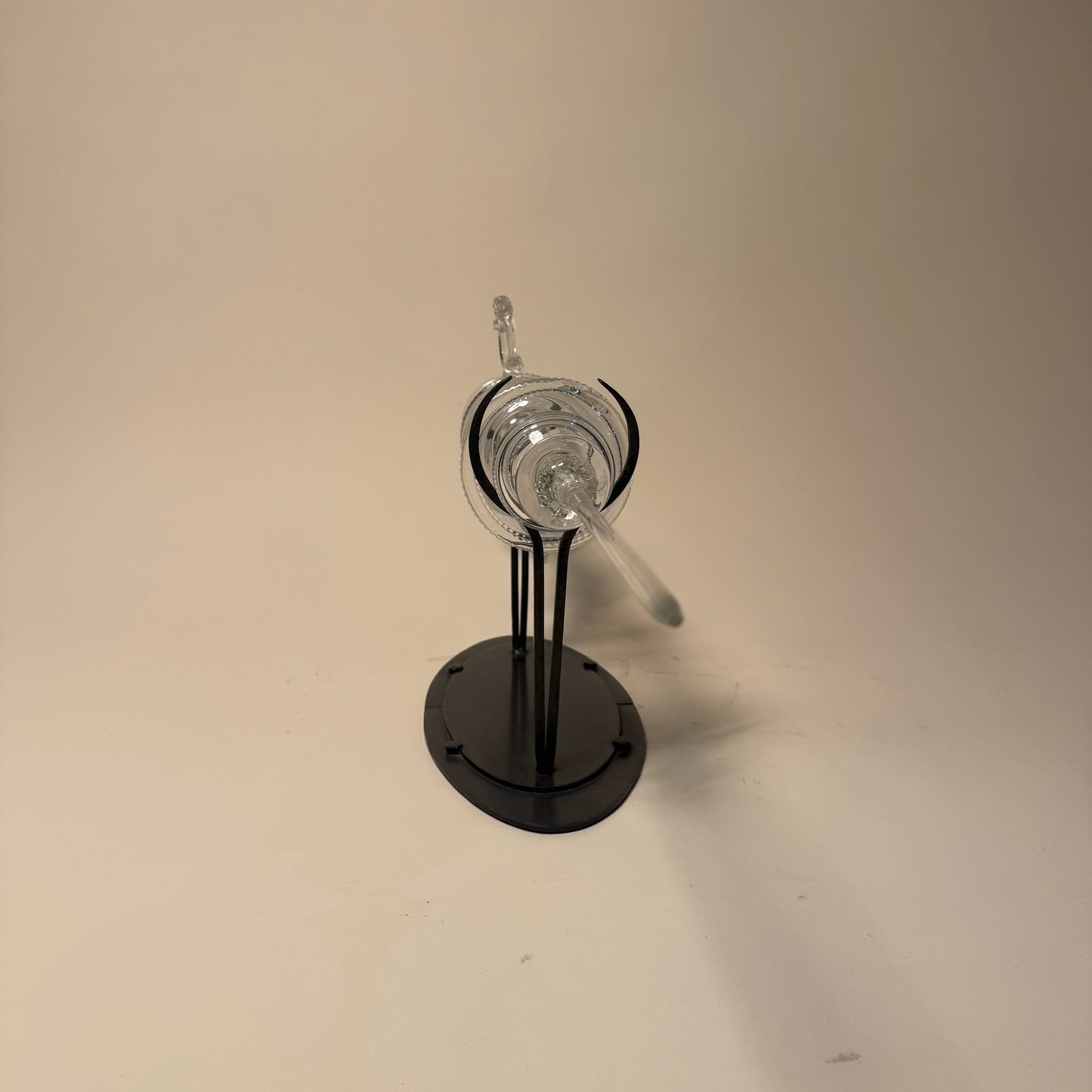Glass Syringe on Metal Stand by Andy Paiko