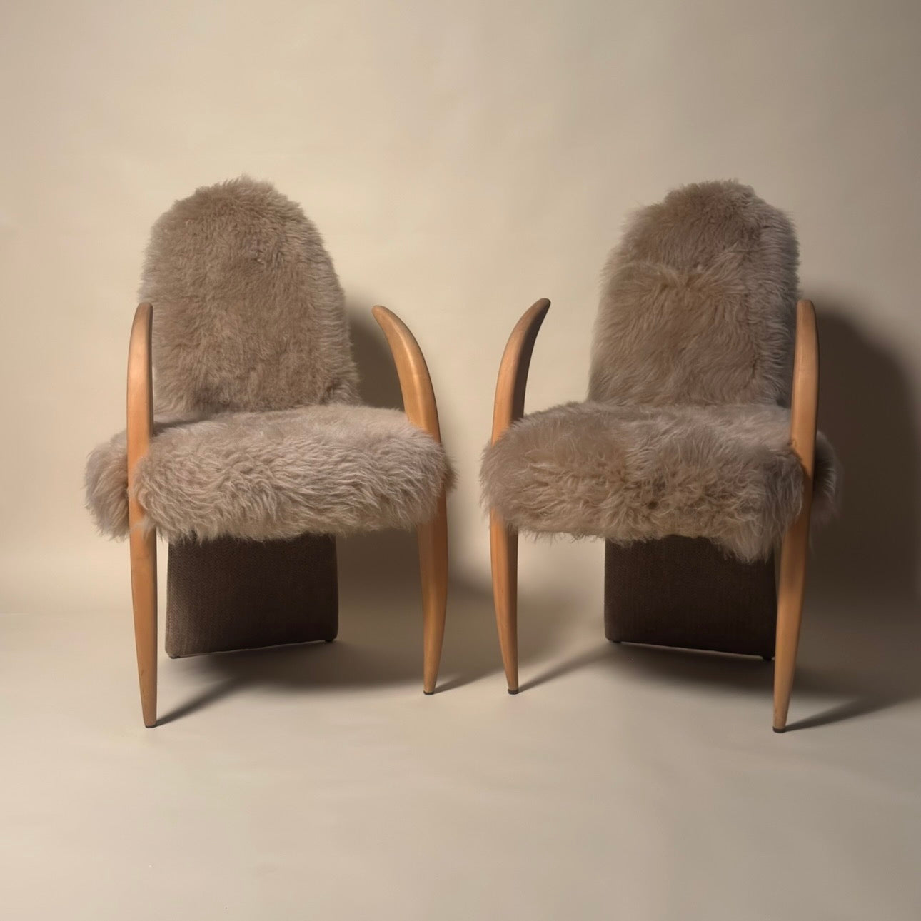 Memphis Style Pair of Sheep Skin "Tusk" Chairs
