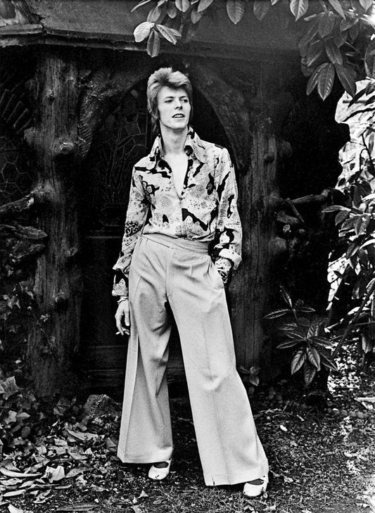 David Bowie in Garden 1972 by Mick Rock