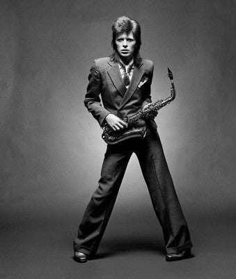 David Bowie with Saxophone 1973 by Mick Rock