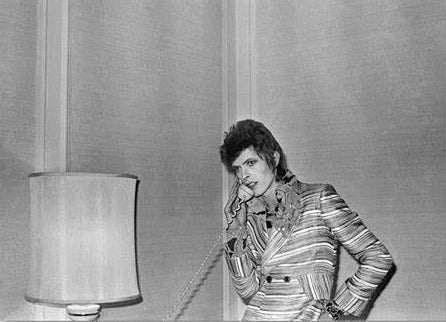 David Bowie w/ Lamp 1972 on Phone by Mick Rock